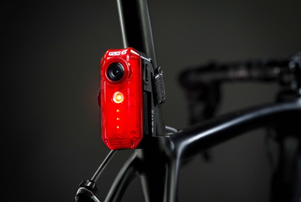 Cycliq Fly6 rear-facing cycling camera mounted on a road bike