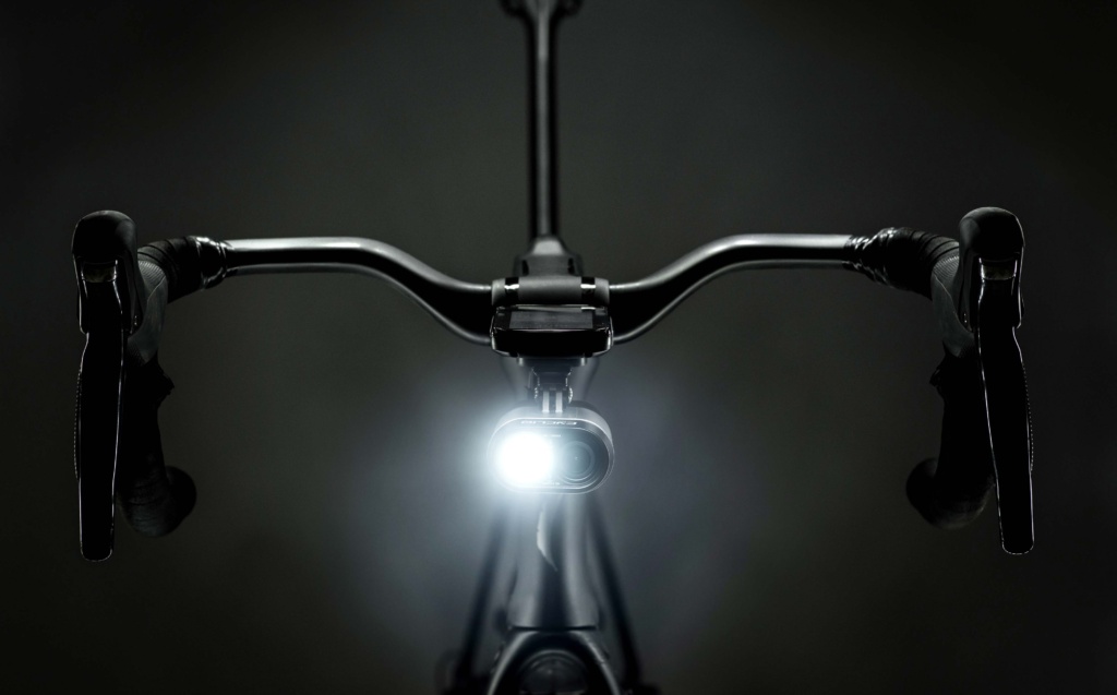 Cycliq front-facing cycling camera and light mounted beneath road bike handlebars