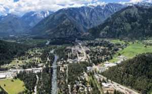 Aerial view of Leavenworth, Washington, surrounded by the Cascade Mountains with the Wenatchee River running through the valley.