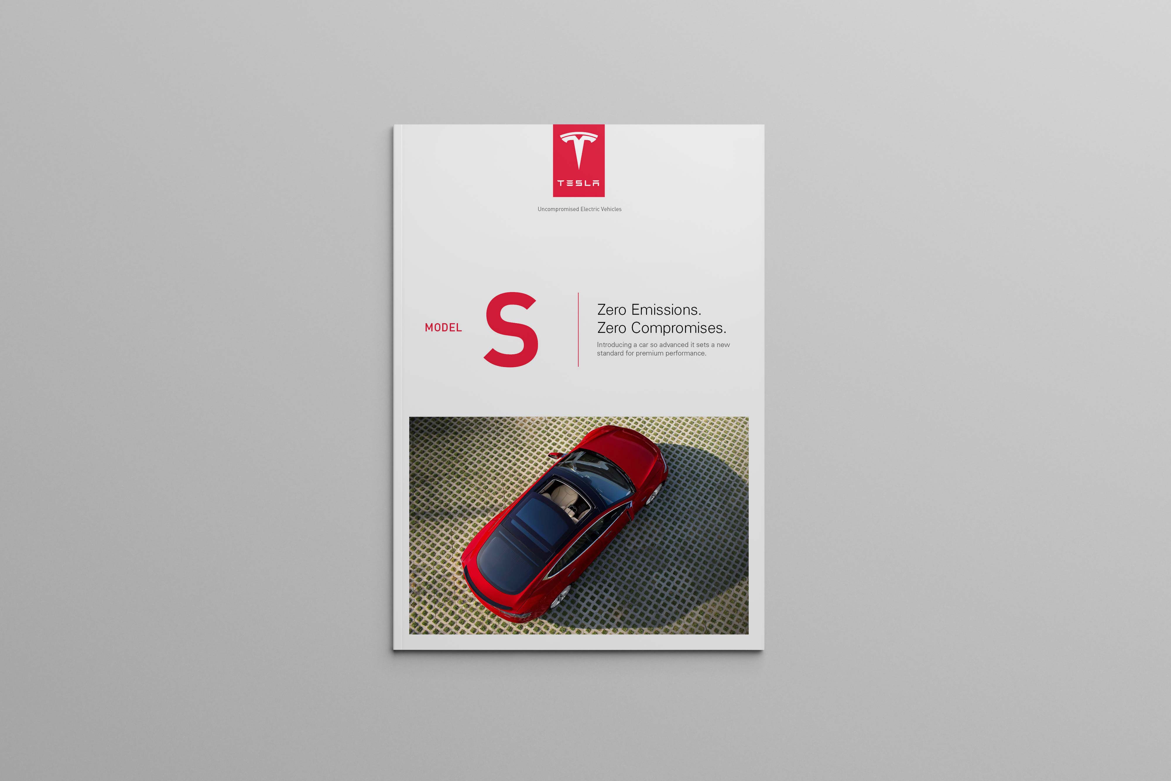 Front cover of the Tesla Model S catalog featuring an overhead photograph of a red vehicle, bold Model S typography, and the statement “Zero Emissions. Zero Compromises.”